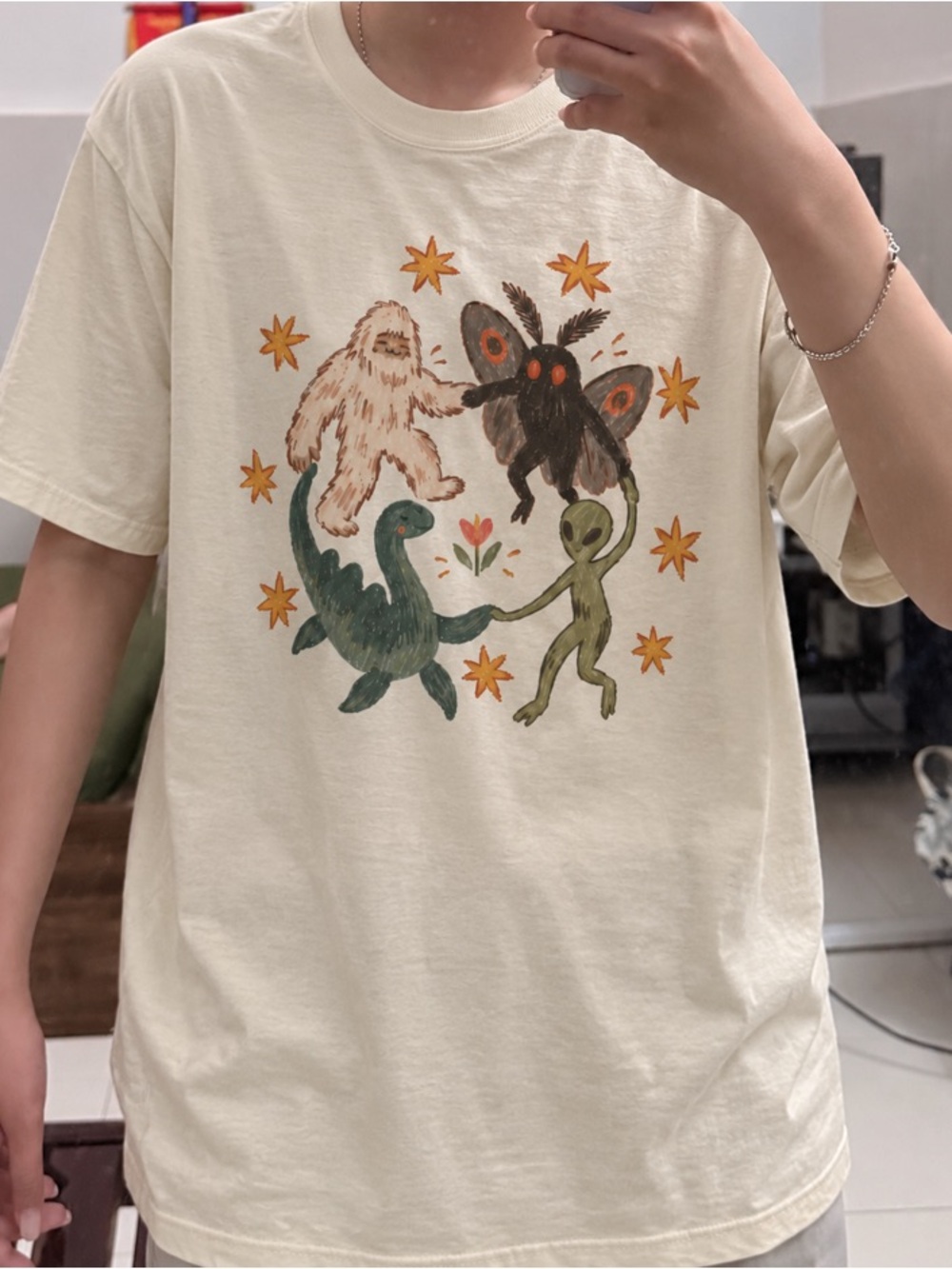 Dancing Cryptids Bigfoot Mothman Alien and Lockness Monster OffWhite T-Shirt - Picture 3 of 3